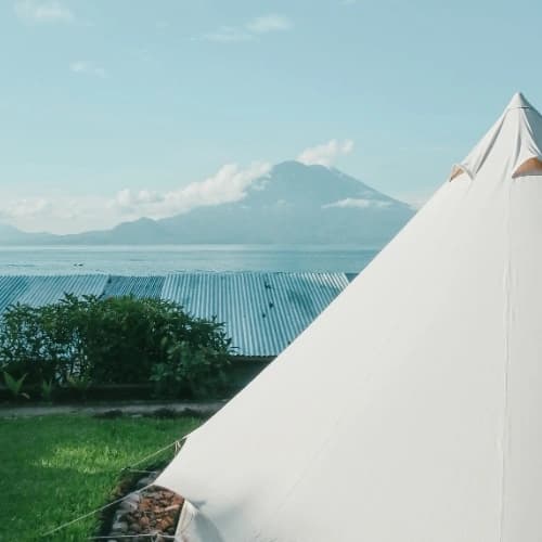 Lake Atitlán with volcanoes and lakeside villages